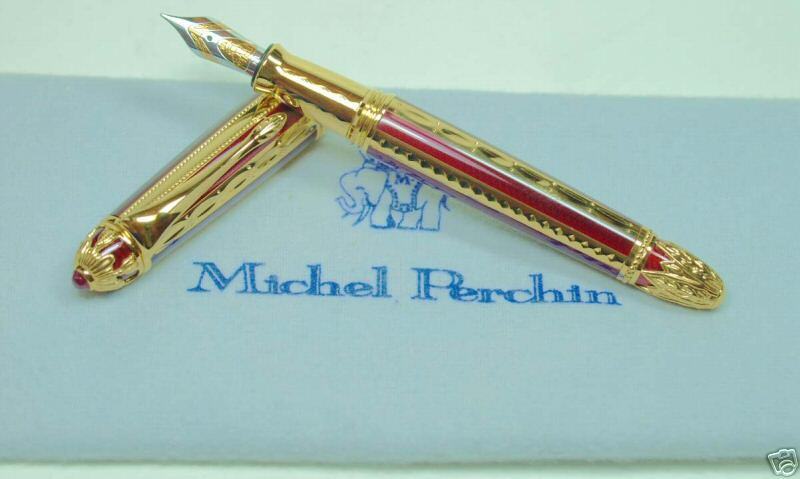 MICHEL PERCHIN RED AND GOLD RIBBED PEN WITH RUBY  