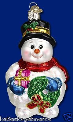   HOLDING WREATH AND GIFT OLD WORLD CHRISTMAS GLASS ORNAMENT 24093